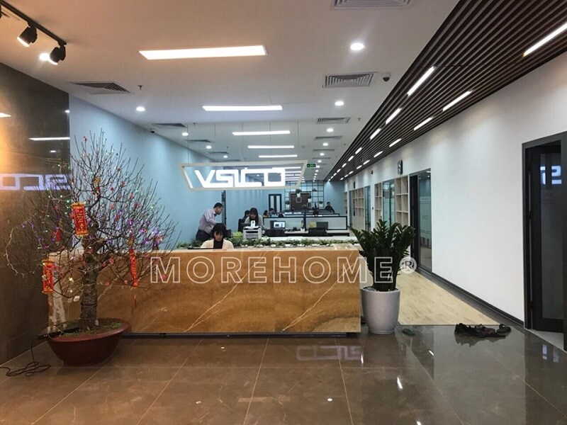 Sử dụng đá nhân tạo LG màu vàng ốp quần lễ tân văn phòng tạo điểm nhấn nổi bật cho không gian làm việc Đá nhân tạo solid surface