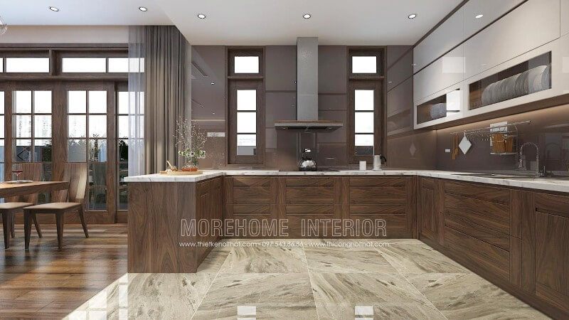 Sở hữu đường vân bắt mắt cùng màu sắc sang trọng, mẫu tủ bếp chữ u gỗ óc chó hấp dẫn mọi ánh nhìn của bất cứ một vị khách nào tới chơi nhà